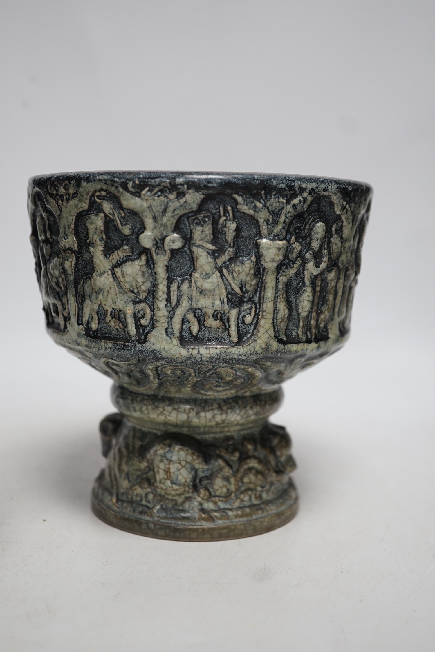 Two Michael Andersen & Sons, Denmark miniature stoneware fonts, one with label to the base; MA&S, both with the same impressed design of the life of Christ, tallest 14.5cm